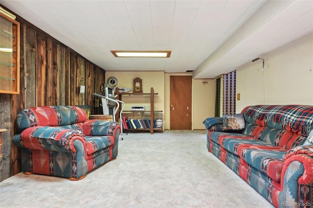 living area featuring carpet