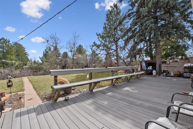 wooden deck with a yard