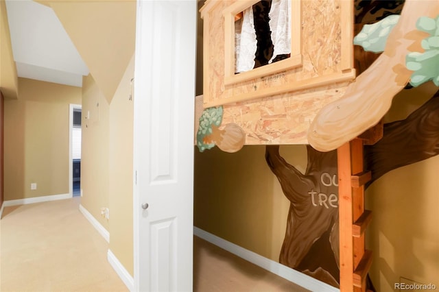 hallway featuring carpet flooring