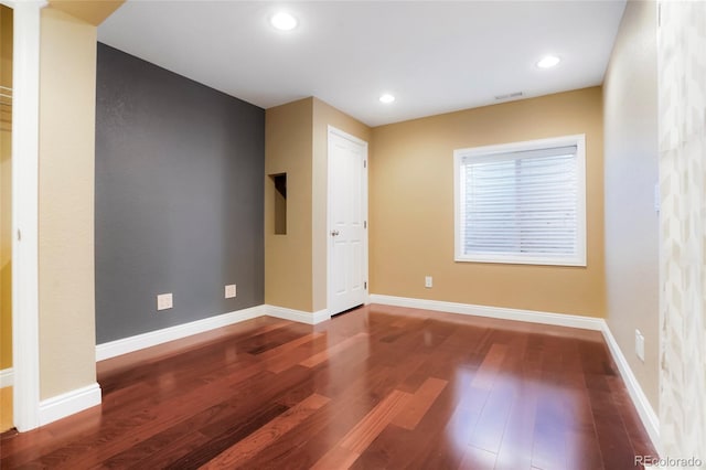 empty room featuring hardwood / wood-style floors