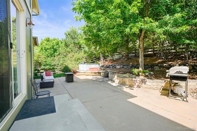 view of patio / terrace with a grill