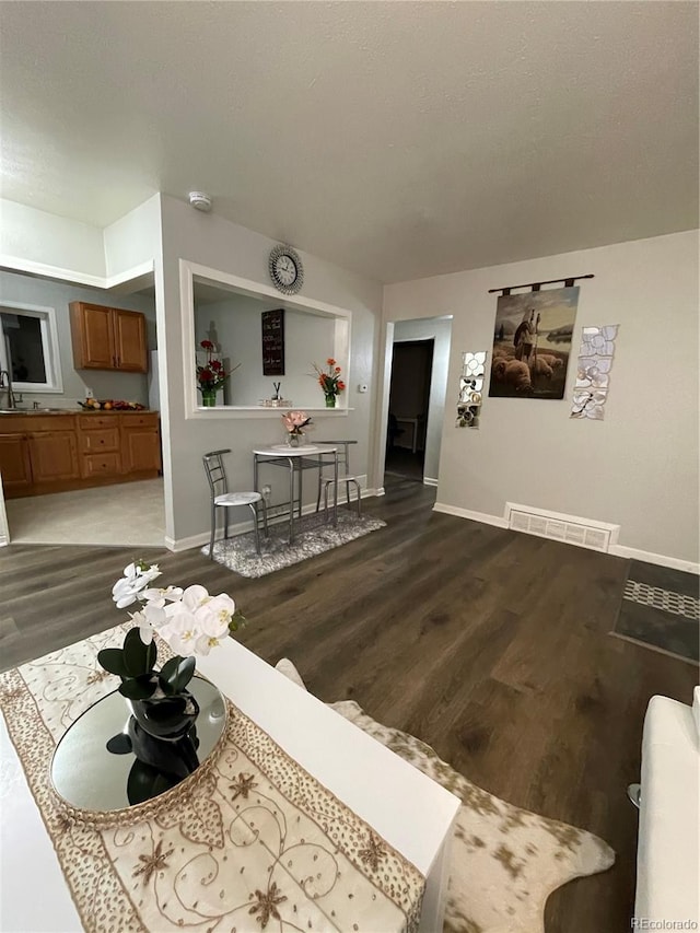 living room with wood-type flooring