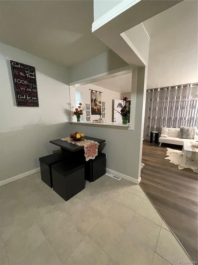 dining room featuring wood-type flooring