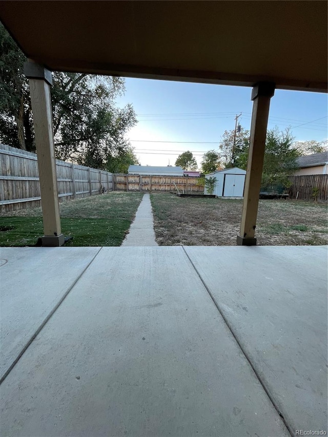 view of patio / terrace with a storage unit