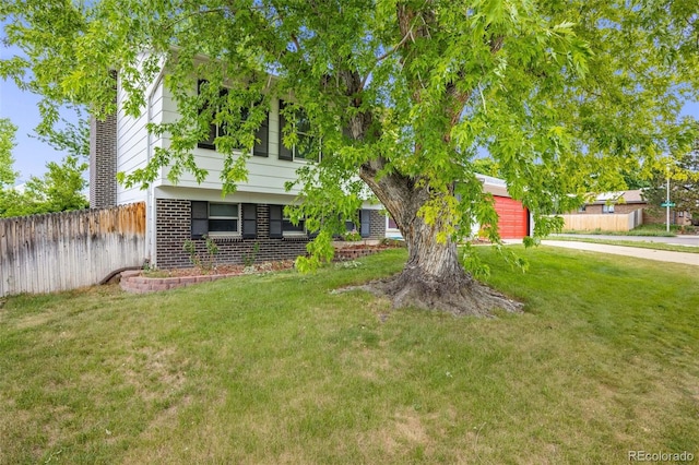 4511 S Braun Ct, Morrison, CO 80465 - view of front of house with brick siding and a garage
