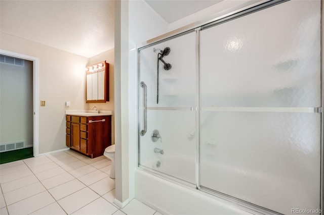 4511 S Braun Ct, Morrison, CO 80465 - full bathroom with vanity, combined bath / shower with glass door, and tile patterned flooring