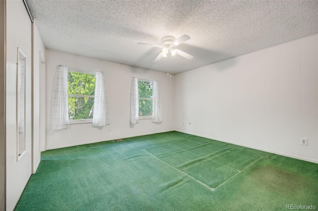 4511 S Braun Ct, Morrison, CO 80465 - empty room featuring carpet flooring, a ceiling fan, and a textured ceiling