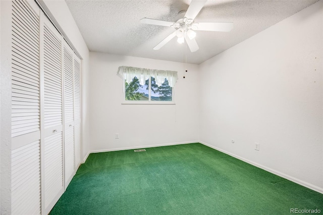 4511 S Braun Ct, Morrison, CO 80465 - unfurnished bedroom featuring a closet, carpet, a textured ceiling, and a ceiling fan