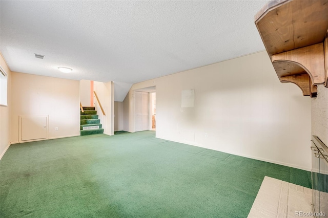 4511 S Braun Ct, Morrison, CO 80465 - below grade area featuring stairway, carpet flooring, and a textured ceiling