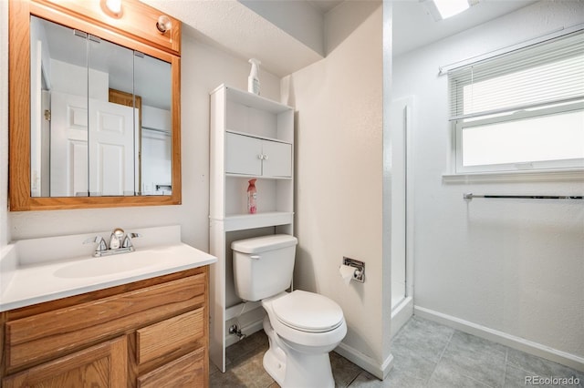 4511 S Braun Ct, Morrison, CO 80465 - bathroom with vanity, a stall shower, and tile patterned floors