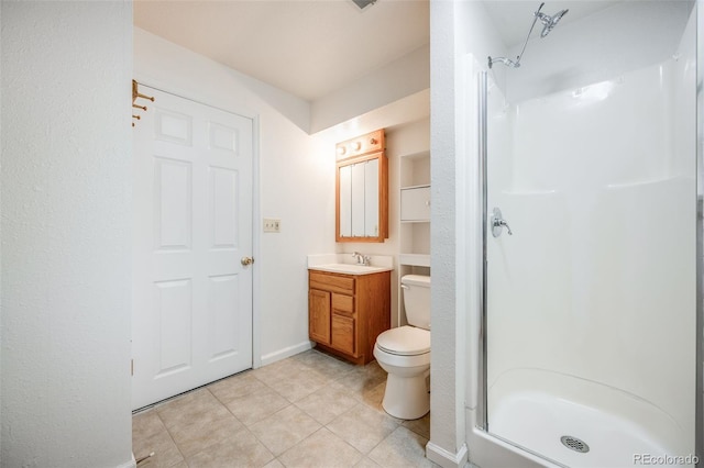 4511 S Braun Ct, Morrison, CO 80465 - bathroom with a shower stall, vanity, and tile patterned floors