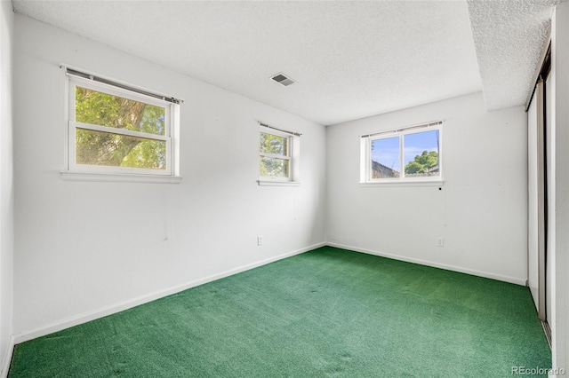 4511 S Braun Ct, Morrison, CO 80465 - unfurnished room with carpet floors and a textured ceiling