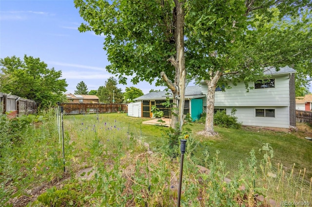 4511 S Braun Ct, Morrison, CO 80465 - fenced backyard featuring a shed