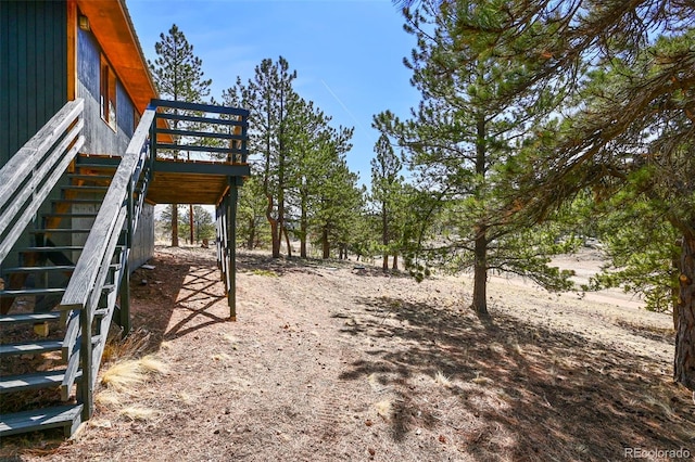 29 Deerfield Ln, Florissant, CO 80816 - view of yard with stairway and a wooden deck