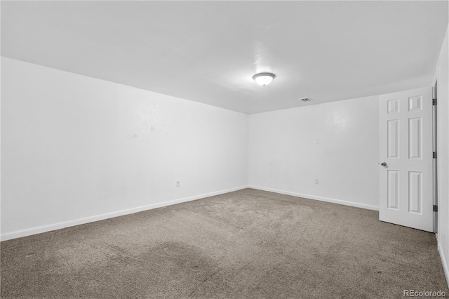 1235 S Benton St, Lakewood, CO 80232 - carpeted empty room featuring baseboards