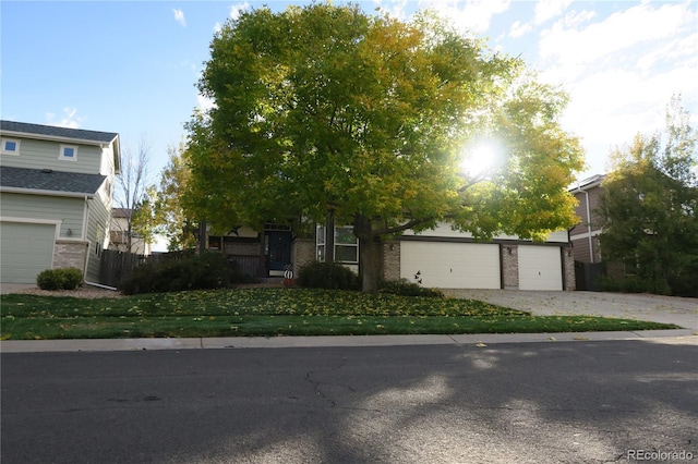 obstructed view of property featuring a garage