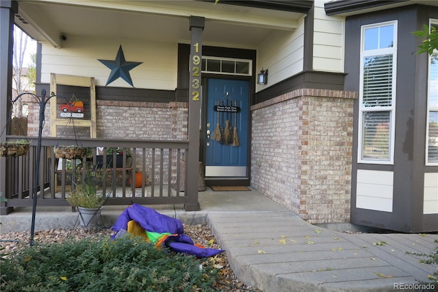 property entrance with a porch