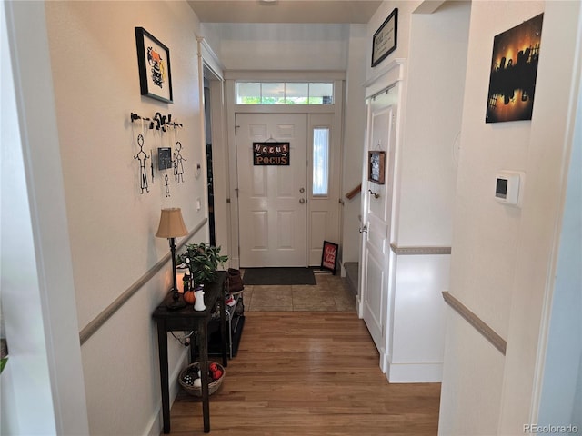 foyer featuring wood-type flooring