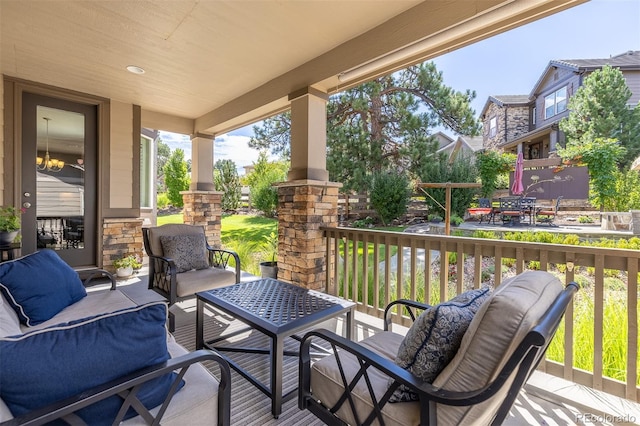 6728 S Catawba Way, Aurora, CO 80016 - wooden terrace featuring outdoor lounge area