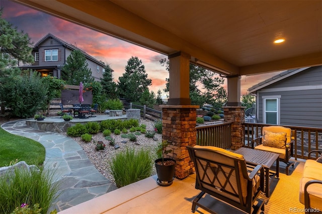 6728 S Catawba Way, Aurora, CO 80016 - patio terrace at dusk with a patio area