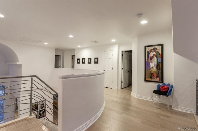 corridor featuring light hardwood / wood-style flooring