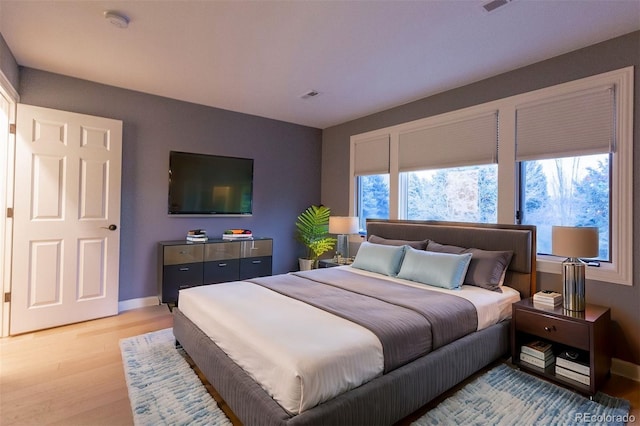 bedroom featuring light hardwood / wood-style floors