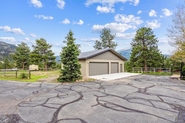 640 Pinewood Ln, Estes Park, CO 80517 - garage with a mountain view