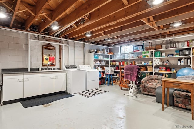 640 Pinewood Ln, Estes Park, CO 80517 - basement featuring separate washer and dryer and a sink