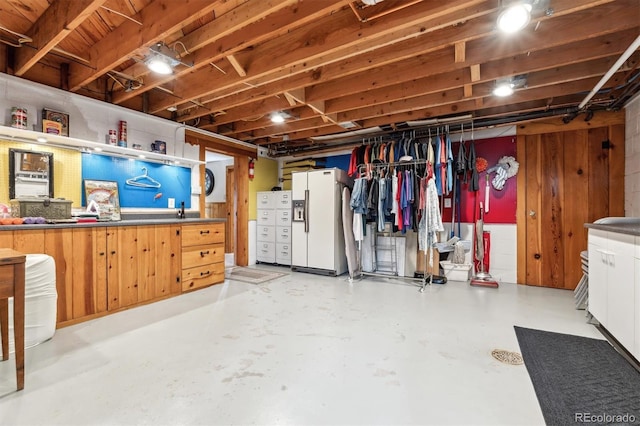 640 Pinewood Ln, Estes Park, CO 80517 - unfinished below grade area with white fridge with ice dispenser