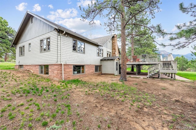 640 Pinewood Ln, Estes Park, CO 80517 - view of home's exterior with a deck and stairway