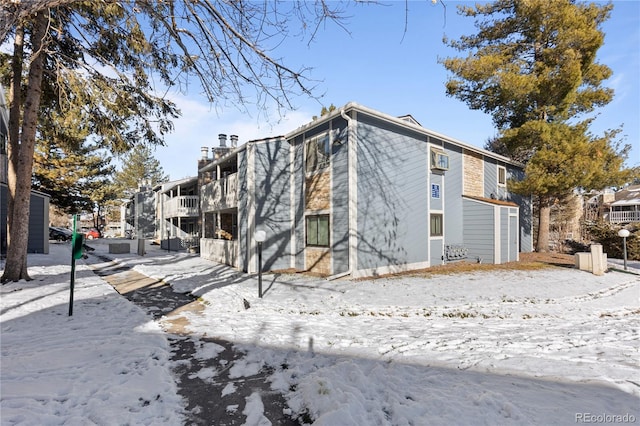 view of snow covered property