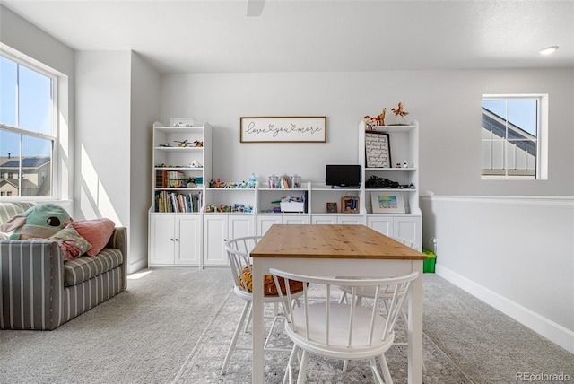playroom with baseboards and carpet