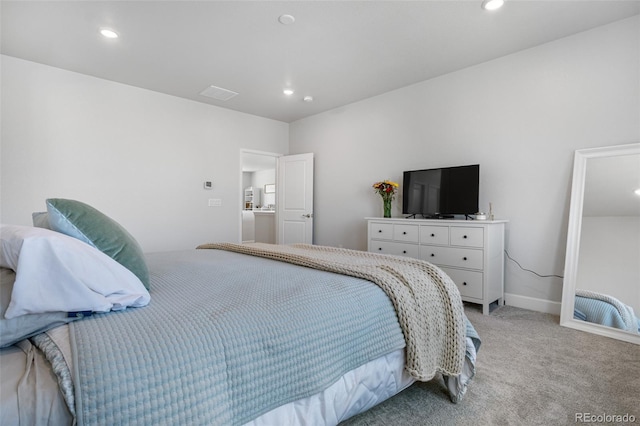 bedroom with baseboards, recessed lighting, and light colored carpet