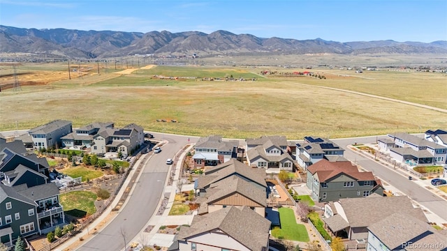 aerial view with a rural view, a residential view, and a mountain view