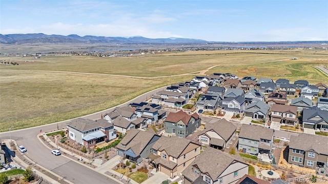 aerial view featuring a mountain view and a residential view