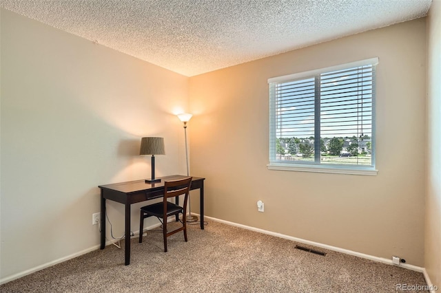 17948 E Colgate Pl, Aurora, CO 80013 - carpeted office space featuring a textured ceiling and baseboards