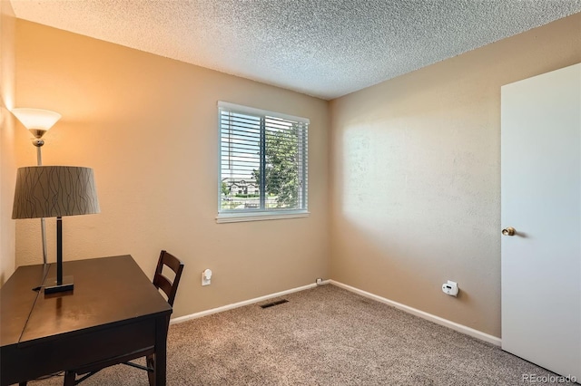 17948 E Colgate Pl, Aurora, CO 80013 - unfurnished office with carpet floors and a textured ceiling