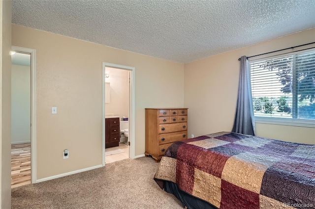 17948 E Colgate Pl, Aurora, CO 80013 - carpeted bedroom with a textured ceiling and connected bathroom