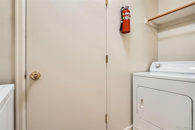17948 E Colgate Pl, Aurora, CO 80013 - laundry area with washing machine and clothes dryer