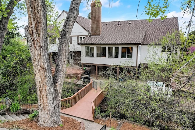 back of property with a patio