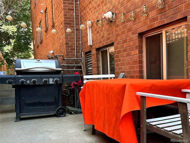 view of patio with a grill