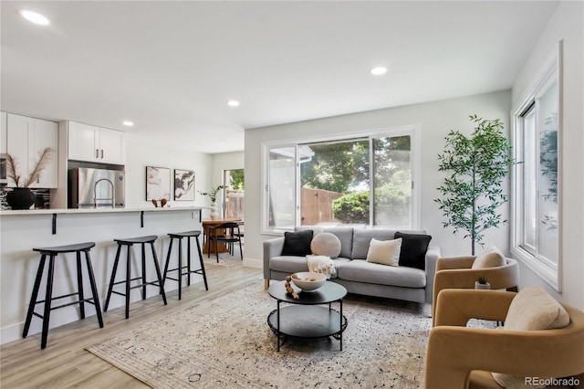 7970 Chase Cir Unit 85, Arvada, CO 80003 - living area with recessed lighting and light wood-style floors