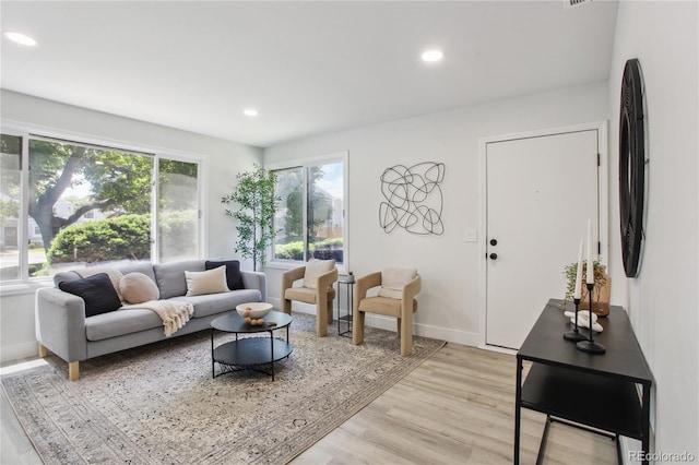 7970 Chase Cir Unit 85, Arvada, CO 80003 - living area featuring light wood-style flooring and recessed lighting