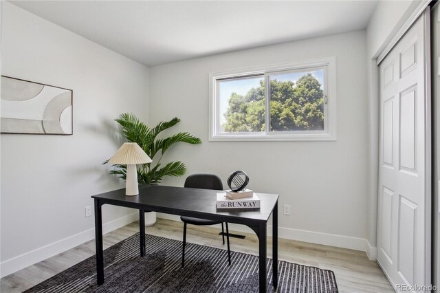 7970 Chase Cir Unit 85, Arvada, CO 80003 - office area featuring light wood-type flooring and baseboards