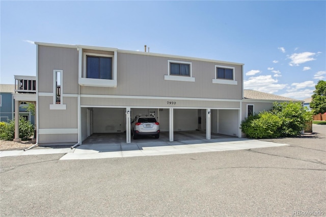 7970 Chase Cir Unit 85, Arvada, CO 80003 - view of front of house featuring a garage and driveway