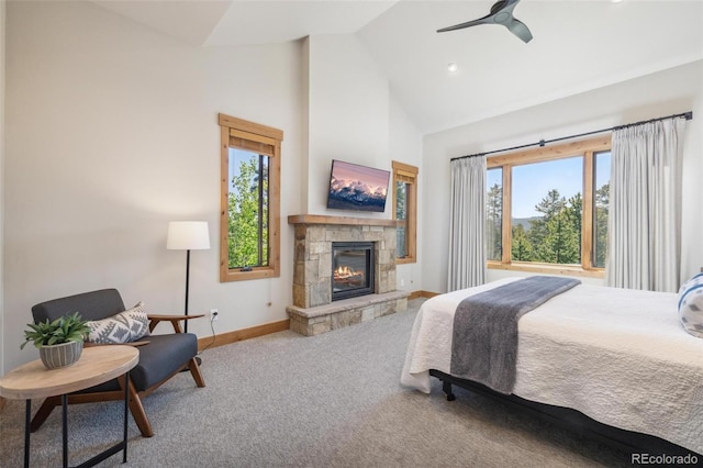 41 Barton Ridge Dr, Breckenridge, CO 80424 - bedroom with carpet floors, a stone fireplace, high vaulted ceiling, recessed lighting, and ceiling fan