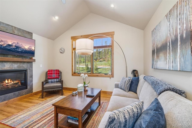 41 Barton Ridge Dr, Breckenridge, CO 80424 - living area with wood finished floors, a fireplace, lofted ceiling, and recessed lighting