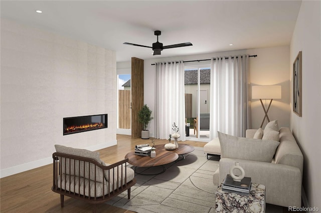 living area with wood finished floors, baseboards, recessed lighting, ceiling fan, and a tile fireplace