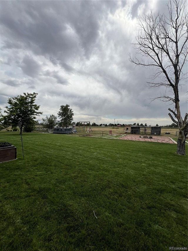 825 Cherokee St, Strasburg, CO 80136 - view of green lawn