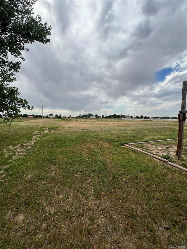 825 Cherokee St, Strasburg, CO 80136 - view of yard featuring a rural view